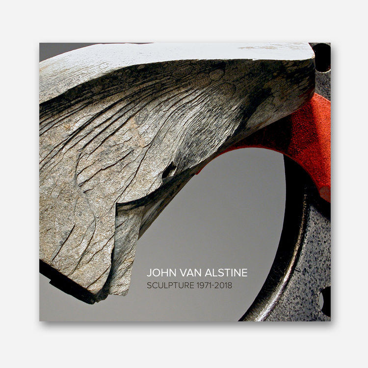 The cover of John Van Alstine: Sculpture 19712018 features a large piece of slate arching across the upper-left corner of the cover.
